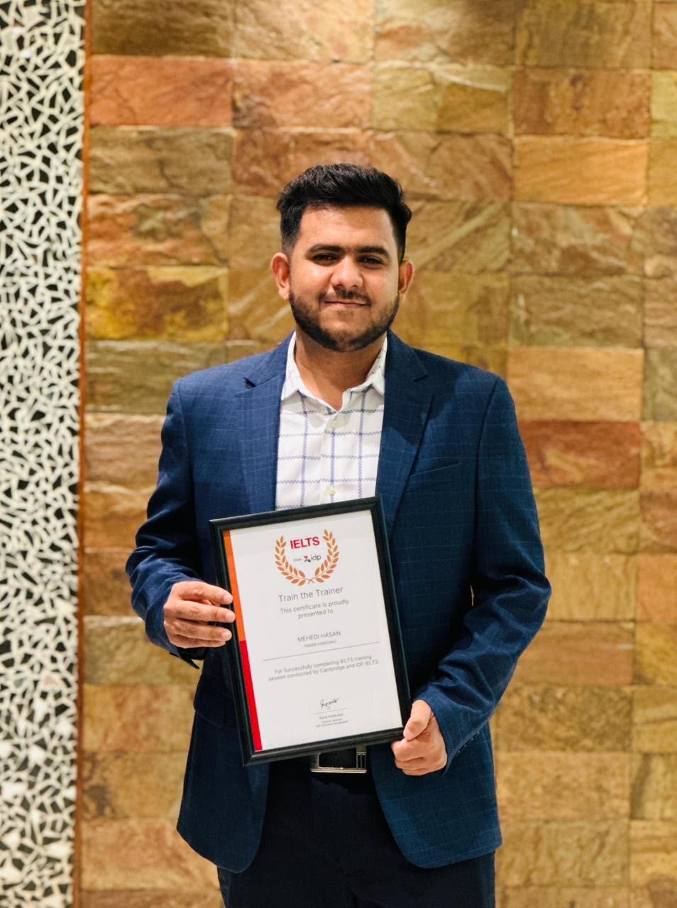 Mehedi receiving British Council trainer certificate